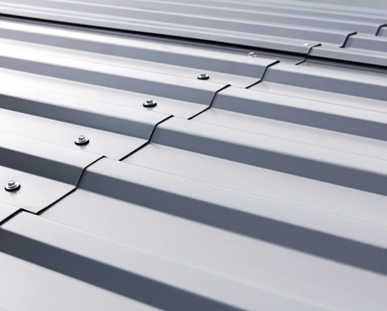 metal commercial roof with metal bolts